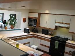 Veneer is a thin layer of wood that can be affixed to less expensive material. Diy Kitchen Cabinet Resurfacing Concepts Homes By Ottoman Homes By Ottoman