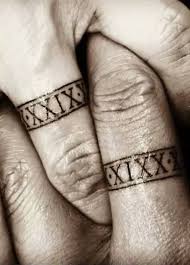 Rings can be lost, but tattoos are forever. Pin By Megs Herrera On Tattoos Tattoo Wedding Rings Ring Tattoo Designs Ring Tattoos