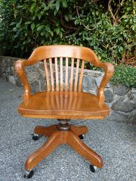 h.krug oak swivel chair circa 1950