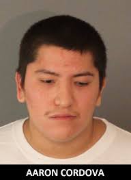 Man arrested after swinging liquor bottle at officer, Riverside police say 