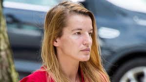 Accused killer couldn't own gun; police say she had one