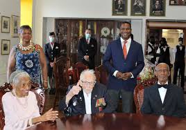 Captain sir tom moore , the centenarian knighted this year after raising £32million for the nhs from his garden in bedfordshire early in the pandemic, spoke to huw edwards about what remembrance means to him. Captain Sir Tom Moore Happy To Be In Barbados Gis