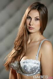 Connie Carter lets big breasts exposed from silver lingerie