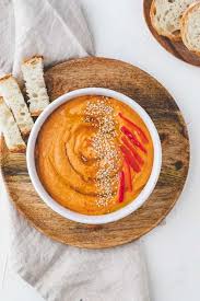 This Easy To Make And Delicious Roasted Red Pepper Hummus Recipe Can Be Enjoyed As A Dip Wit Homemade Hummus Red Pepper Hummus Recipe Roasted Red Pepper Hummus