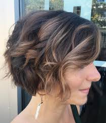 A taper hairstyle will see the hair on the sides of the head gradually get shorter as it gets closer to the ears, but doesn't have to expose skin. 50 Absolutely New Short Wavy Haircuts For 2021 Hair Adviser