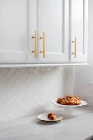 We did not find results for: Herringbone Backsplash With High Gloss White Subway Tile Lew Hardware B Trendy Kitchen Backsplash Backsplash Kitchen White Cabinets Kitchen Backsplash Designs