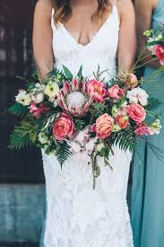 Tropical bouquet, beach wedding bouquet, bridesmaid bouquet, coral orange and turquoise bouquet, plumeria bouquet, calla plumeria bouquet wedideas 5 out of 5 stars (4,349) $ 43.00. 19 Tropical Wedding Bouquets