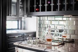 Feb 19, 2016 · a light green backsplash adds refreshing color to this neutral kitchen. Another Crafty Girl Housekeeping Blog Mirrored Subway Tile Mirror Backsplash Backsplash Designs