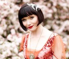 The sides are tucked neatly behind his ears. 11 Glam Great Gatsby Hairstyles For Halloween And Beyond