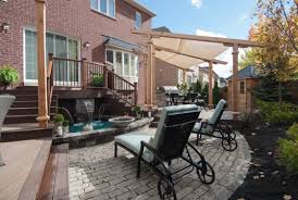 Stone patio ideas with firepit. Decks Vs Patios Cost Pros Cons Comparisons Decks Com