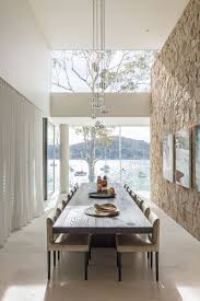 The Waterfront Retreat By Koichi Takada Architects Long Dining Room Tables Dark Wood Dining Table Dining Room Design
