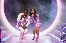 Read about who dua lipa is dating now and who she's dated in the past, such as model isaac carew. Grammy Awards 2021 Dua Lipa Strips Down To Sparkly Pink Bikini After Performance Daily Mail Online