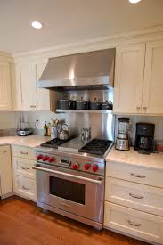 coastal kitchen with yellow cabinets