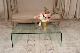 Add some clarity to your living room with the acrylic waterfall coffee table is the perfect addition to any home, bringing with it a clean, stylish feel that is sure to add some life to your living space. Glass Waterfall Coffee Table Randal Events