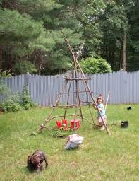 We used a small handheld saw to cut the smaller stick into pieces and hot glue to secure in place. How To Build A Teepee 6 Steps Instructables