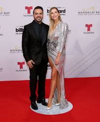 Puerto rican singer who began as a crooner and toughened up his sound over the years. Las Vegas Nevada April 25 Singer Songwriter Luis Fonsi L And His Wife Model Agueda Lopez Attend The 2019 Billboard Singer Songwriter Songwriting Singer