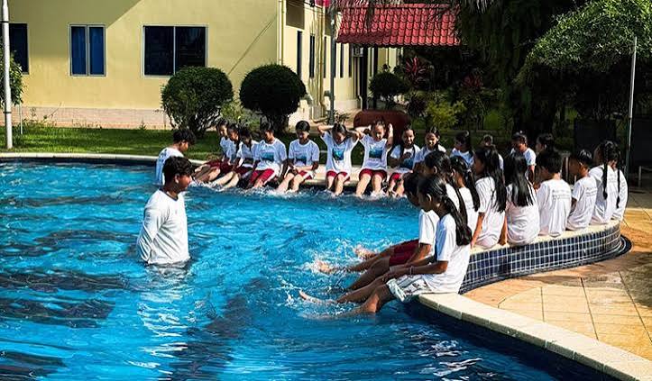 Swimming lessons give Cambodian children skills to stay safe
