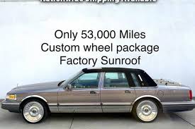 Image result for Silver 1990 Lincoln