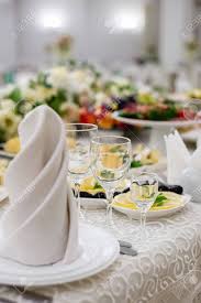 Salad plates are usually only used in formal dinners. Vertical Images Of Elegant Dinner Table Setting In Restaurant Or Hotel With Wine Glasses Luxurious Elegant Dinner At The Table Holiday Table Decoration Stock Photo Picture And Royalty Free Image Image 156413671
