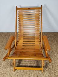 Sitting on this chaise lounge chair is recommended if you want to relax instantly after getting tired of routine tasks. Vintage Collapsible Wood Slat Sling Lounge Chair By Indusparquet Epoch
