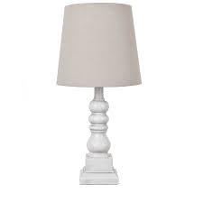 This lamp with round off white fabric shade emits a nice warm glow and would be a perfect addition to any bedroom nightstand, living room, or desk. White Bedroom Lamps Online
