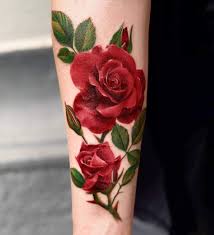 Flowers remain a main choice for tattoo designs featuring the names of kids and this dominant shoulder tattoo shows this quite effectively. Top 81 Best Rose Vine Tattoo Ideas 2021 Inspiration Guide