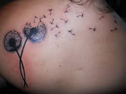 Beautiful birds flying from dandelion tattoo on lower back. Dandelion Foot Tattoos With Quotes Quotesgram