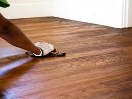 Brush the polyurethane just like brushing paint. How To Stain A Hardwood Floor How Tos Diy