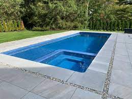 With every fiberglass pool, we offer up to a lifetime warranty on both pool and spa structures and up to a lifetime warranty on the surface. Astoria 15 10x40 Blue Hawaiian Pools Of Michigan