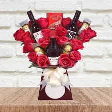 One dozen pink roses with chocolates and a bear. Red Wine And Roses Chocolate Bouquet Funky Hampers