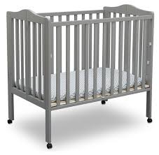 Delta Children Folding Portable Mini Crib With Mattress Ashley Furniture Homestore Travel Crib Delta Children Portable Crib