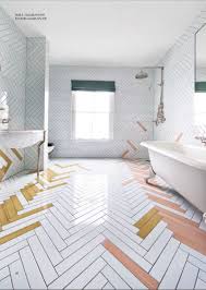 Pair a gray rug with gray shower tiles, and use a white towel to echo the white marble on your bathroom counters. Made A Mano Collection Notapaperhouse Com Magazine White Bathroom Tiles Bathroom Floor Tile Patterns Bathroom Floor Tiles