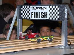 It's a lot faster than a hand saw and the guide on the jig saw will help keep the cut level. How To Make A Fast Pinewood Derby Car Scout Life Magazine