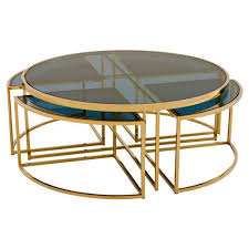 Shop our large modern coffee tables selection from the world's finest dealers on 1stdibs. Eichholtz Padova Modern Classic Smoked Glass Round Nesting Gold Round Coffee Table 31 W 40 W Kathy Kuo Home