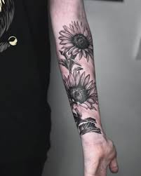 The sunflower's symbolism varies from region to region a forearm tattoo of three richly detailed sunflowers drawn inside a triangle. 40 Best Sunflower Tattoo Design Ideas Meaning And Inspirations Saved Tattoo