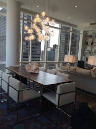 Using a chandelier for your dining room lighting is one of many ways to bring light to this room. Modern Contemporary Dining Room Lighting Novocom Top