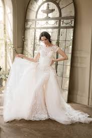 Appliquès and crystals adorn the cap sleeves and waist, while the. Champagne Wedding Dresses Justin Alexander