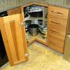 The lazy susan spice rack is a corner cabinet alternative on the market, which allows the opportunity to store pots and pans in a corner cabinet as well as spices and jars. 1