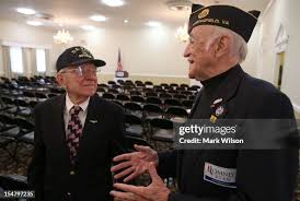 Retired U.S. Navy CMR. John Schroeder , and WWII veteran Capt.... News  Photo