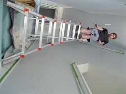 To reach stairwell ceilings for painting projects and other work, use an extension ladder as shown here. The Stairway Gets A Facelift And It S About Time What The Vita