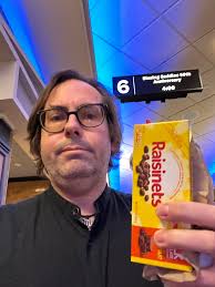 I don't suppose it takes a Rocket Scientist to figure out what I'm getting  ready to watch. Even have Hedley's Raisinets. Didn't even try to pass as  Student.