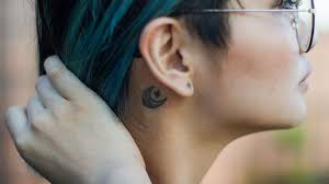 Nice breast cancer tattoo design for foot. What Your Crescent Moon Tattoo Actually Means