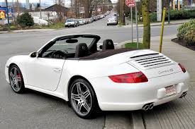 There simply isn't a better steering car on earth. 2008 Porsche 997 C4s Cabrio White Cocoa Porsche Porsche 911 Porsche 911 Carrera