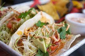 The venue is colorful and has various images, paintings, and flags to give it a mexican vibe. Bayou Fish Tacos Picture Of Duke S New York City Tripadvisor