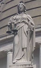 Blindfolded Lady With Sword In Right Hand Held Vertically Down To Floor And A Set Of Balance Scales In Her Left Hand Lady Justice Lady Justice Statue Justitia