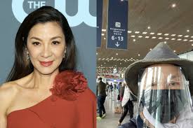 Born 6 august 1962) is a malaysian actress who rose to fame in 1990s hong kong action films and is best known internationally for her roles in the james bond film tomorrow never dies (1997) and martial arts film crouching tiger, hidden dragon (2000). Michelle Yeoh Dons Mask Goggles Face Shield On Flight To Sydney The Star