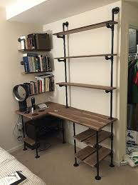 Still based upon cast iron pipe, the construct would be capable of supporting any reasonable retail load. 49 Wall Mounted Desks Built With Pipe Simplified Building