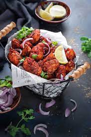 Spicy Chicken Fry Bites Served In Basket With Onions And Lemon On The Side Friedchicken Chicken Appetizer Recipes Spicy Fried Chicken Cooking Recipes