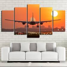 Buy airline posters designed by millions of artists and iconic brands from all over the world. Airplane Sunset Sunrise Cityscape Landing Framed 5 Piece Canvas Wall A Buy Canvas Wall Art Online Fabtastic Co