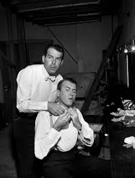 Oh dear… even though it's a hard work looks like its worth it. Great Shot Of Actors And Friends Fred Macmurray And Jimmy Stewart Playing Around Backstage Frank Worth 1956 Classic Movie Stars Actors Classic Hollywood